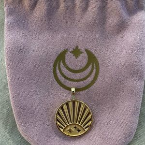 Jane Winn Rising Sun Cut-Out Coin Pendant